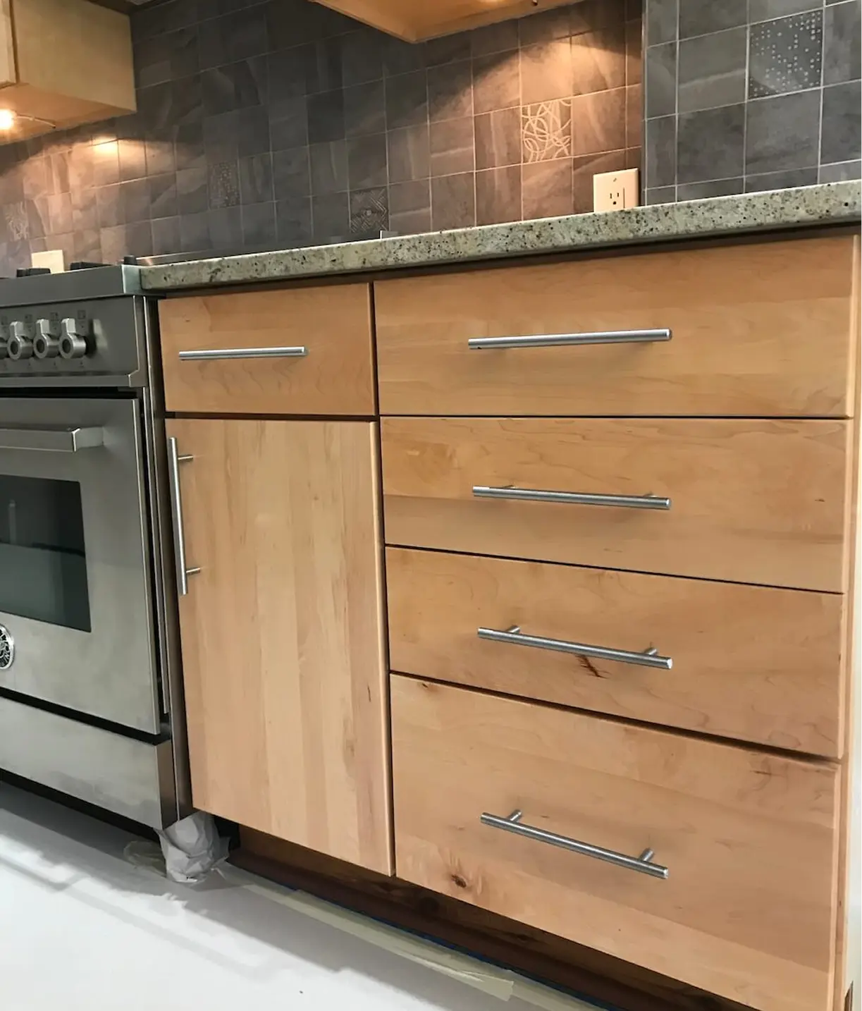 Kitchen cabinet refinishing in a modern house in Philadelphia, PA.